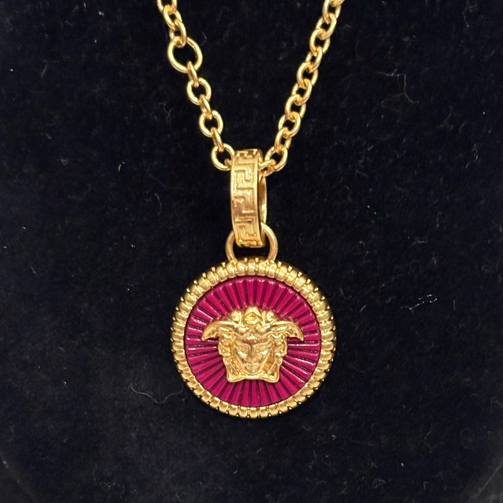 Vercase stamped zipper pull on unbranded necklace
